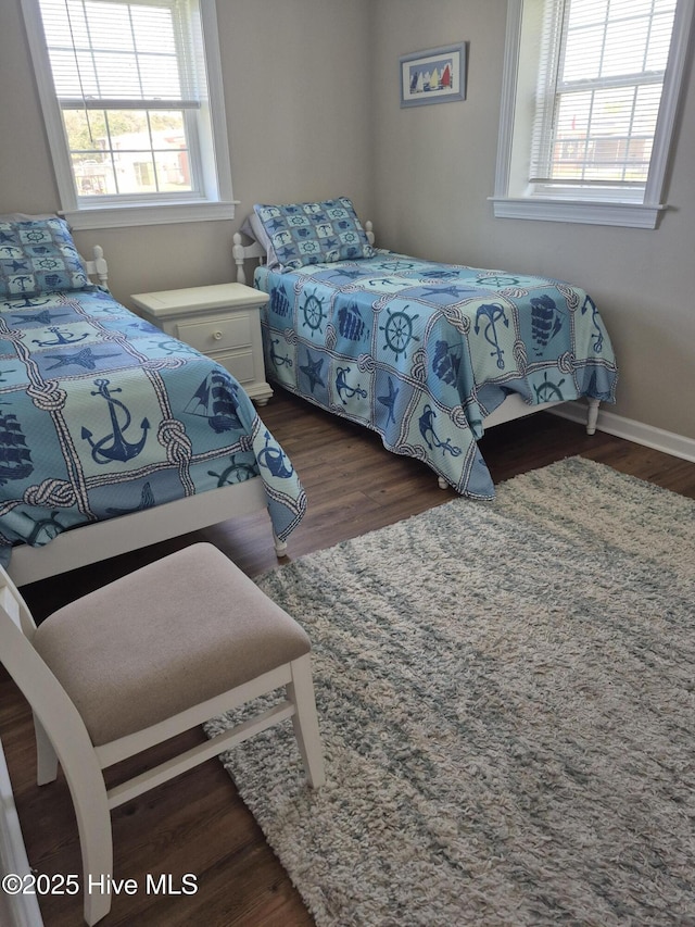 515 Mulberry St, Beaufort, NC 28516 - bedroom featuring dark wood finished floors and baseboards