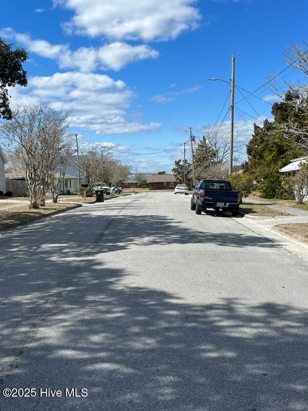 515 Mulberry St, Beaufort, NC 28516 - view of asphalt road featuring street lighting, curbs, and sidewalks