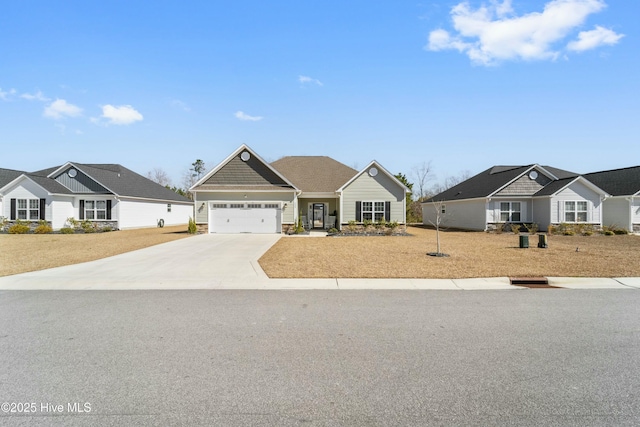 view of front facade with a garage and concrete driveway