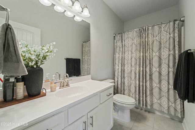 bathroom with tile patterned flooring, a shower with shower curtain, toilet, and vanity