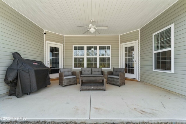 view of patio with an outdoor living space, a grill, and ceiling fan