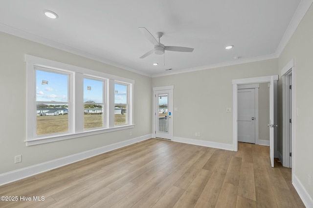 empty room with ceiling fan, baseboards, ornamental molding, recessed lighting, and light wood-style flooring