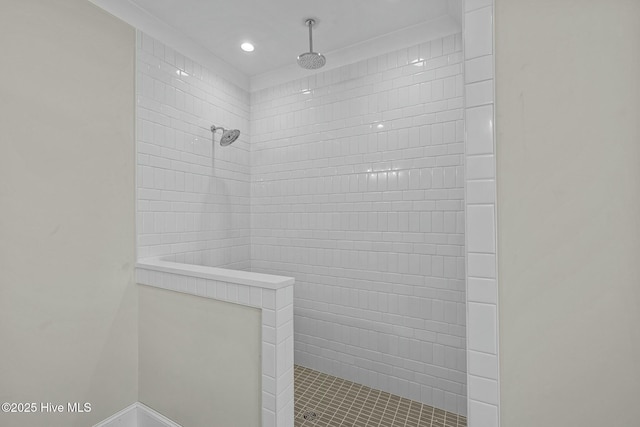 full bathroom with a tile shower