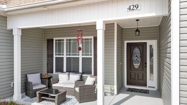 property entrance featuring covered porch