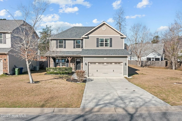 view of front of home featuring a front lawn, central AC unit, fence, and driveway