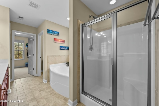 full bath featuring tile patterned floors, a bath, visible vents, and a stall shower