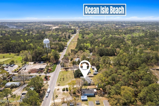drone / aerial view with a view of trees