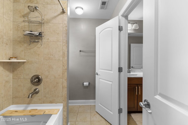 full bath with vanity, baseboards, visible vents, tile patterned flooring, and shower / washtub combination