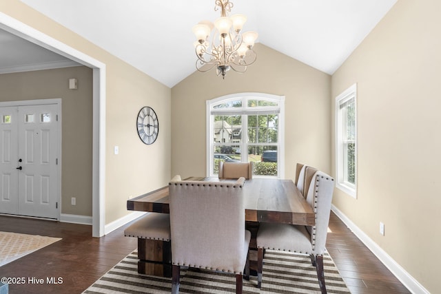 dining space featuring vaulted ceiling, a notable chandelier, dark wood-style floors, and baseboards