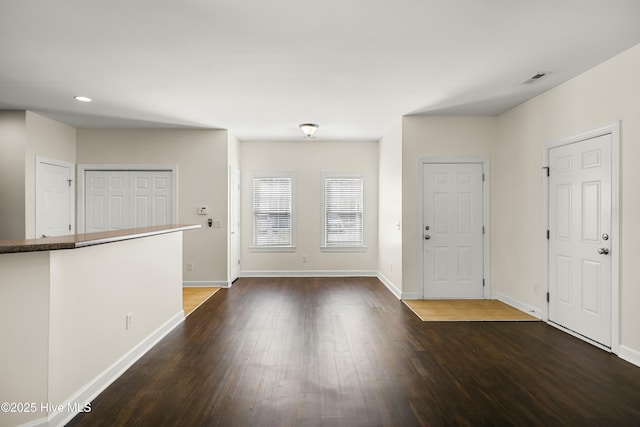 1012 Lake Norman Ln, Leland, NC 28451 - entryway with recessed lighting, dark wood finished floors, visible vents, and baseboards