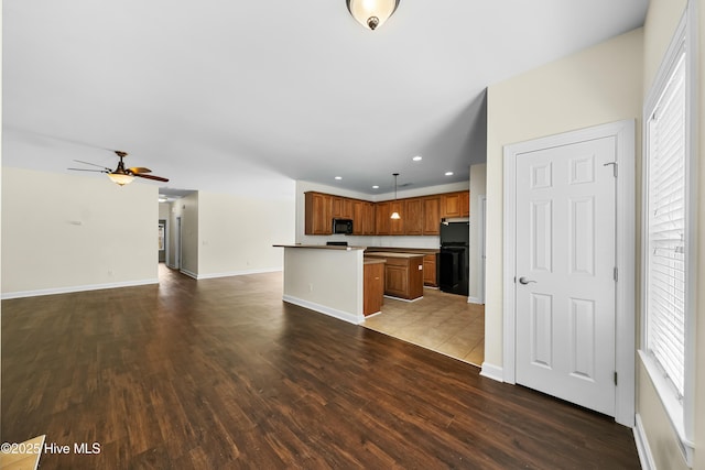 1012 Lake Norman Ln, Leland, NC 28451 - unfurnished living room featuring recessed lighting, wood finished floors, a wealth of natural light, and a ceiling fan