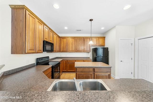 1012 Lake Norman Ln, Leland, NC 28451 - kitchen with recessed lighting, a sink, brown cabinets, and black appliances