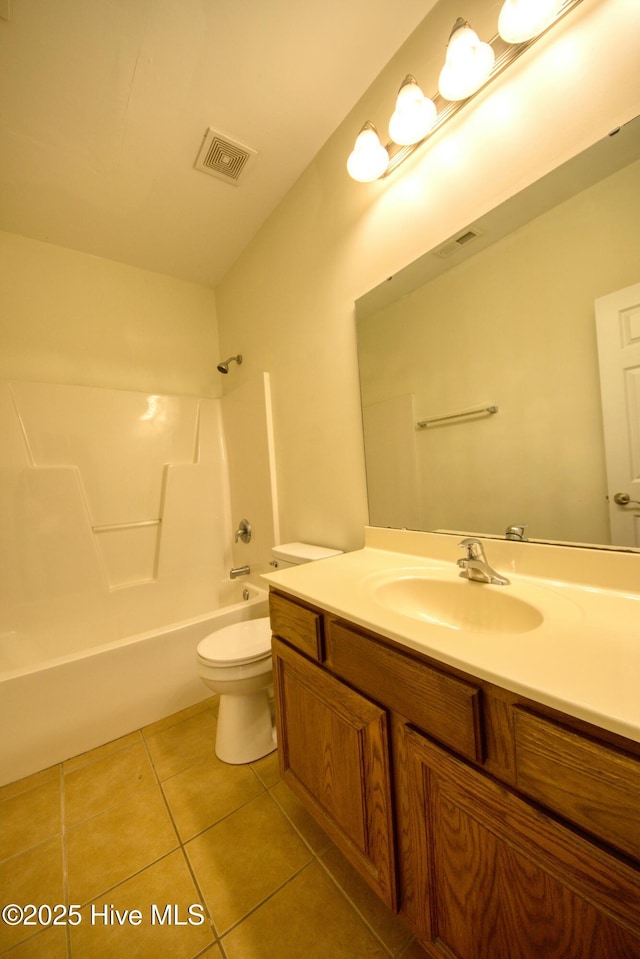 full bath featuring visible vents, toilet, shower / washtub combination, tile patterned flooring, and vanity