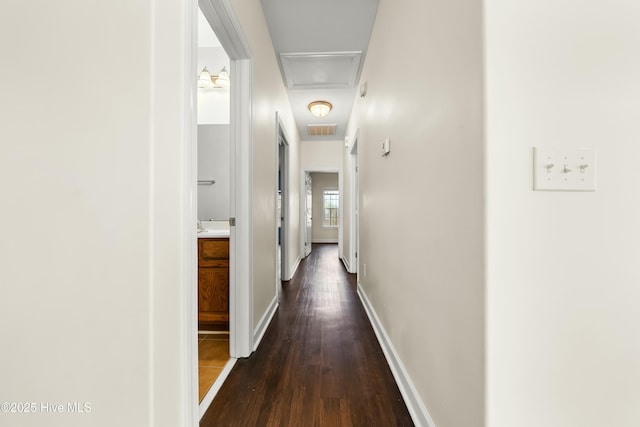 1012 Lake Norman Ln, Leland, NC 28451 - hall featuring baseboards, dark wood-type flooring, and visible vents