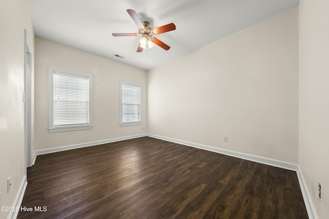 1012 Lake Norman Ln, Leland, NC 28451 - unfurnished room featuring baseboards, visible vents, and dark wood finished floors
