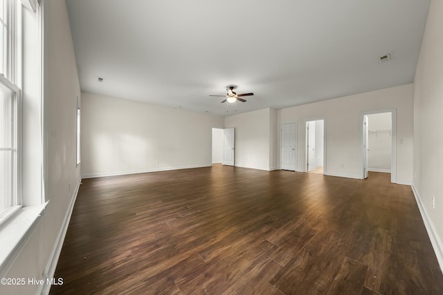 1012 Lake Norman Ln, Leland, NC 28451 - unfurnished room with a ceiling fan, baseboards, and dark wood-style flooring