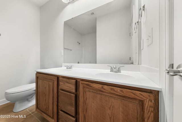 1012 Lake Norman Ln, Leland, NC 28451 - full bathroom featuring a shower, toilet, a sink, and double vanity