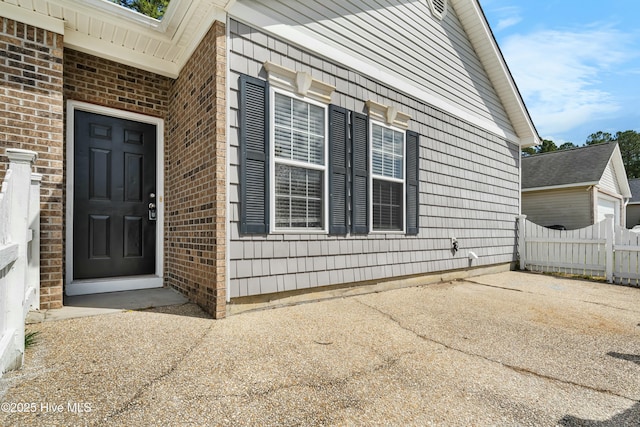 1012 Lake Norman Ln, Leland, NC 28451 - entrance to property featuring fence and brick siding