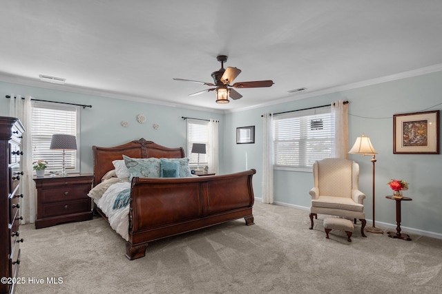 bedroom featuring light carpet, visible vents, multiple windows, and ornamental molding