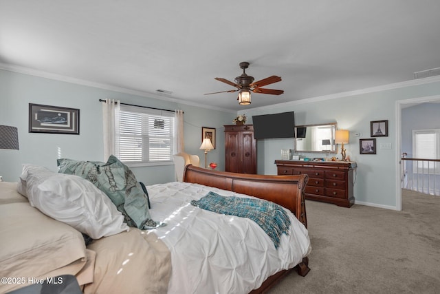 bedroom with visible vents, light colored carpet, and ornamental molding