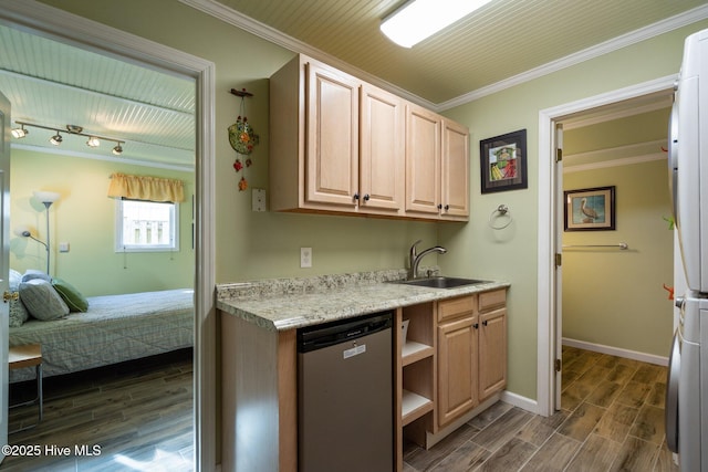 kitchen featuring crown molding, wood tiled floor, dishwasher, light countertops, and a sink