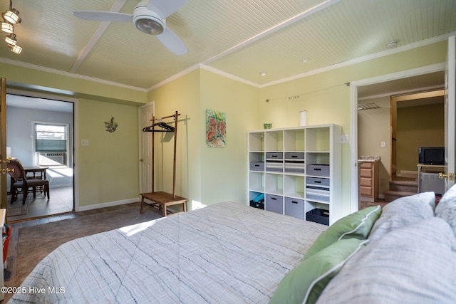 tiled bedroom with a ceiling fan, baseboards, and ornamental molding