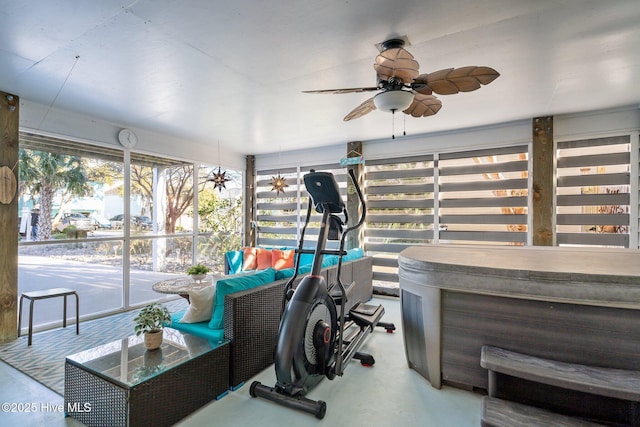 workout room with a ceiling fan