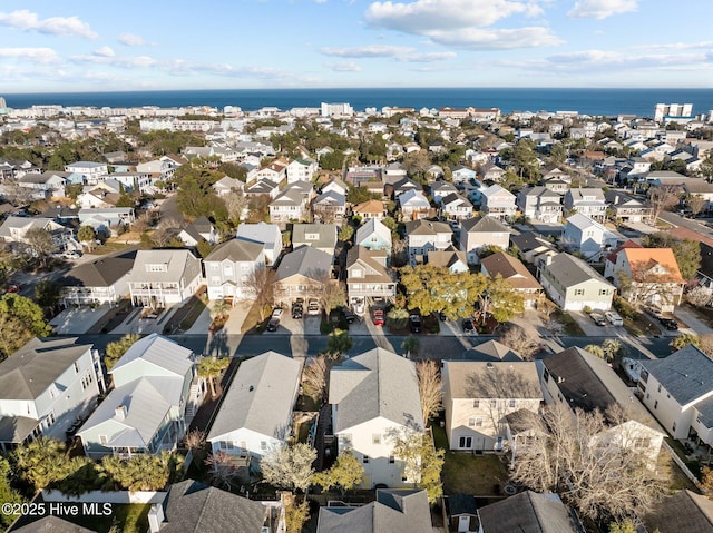 bird's eye view with a residential view and a water view