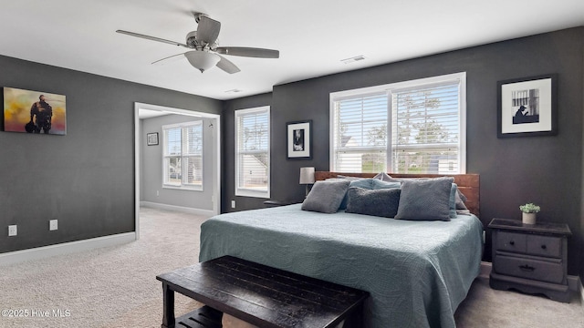 bedroom featuring visible vents, ceiling fan, baseboards, and carpet floors