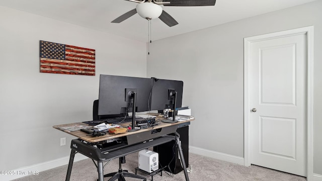 office with carpet flooring, baseboards, and ceiling fan