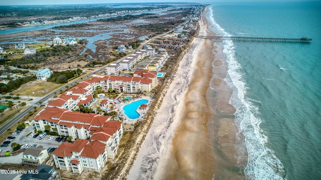 aerial view featuring a water view and a view of the beach