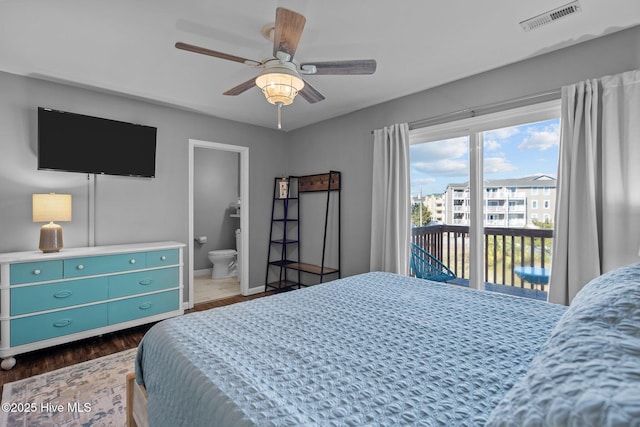 bedroom featuring wood finished floors, visible vents, ensuite bath, ceiling fan, and access to outside