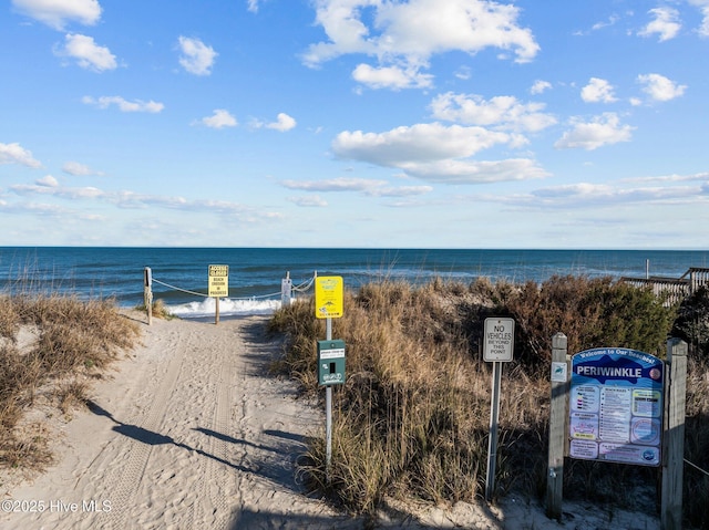 view of water feature with a beach view