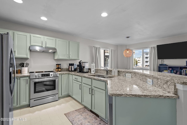 kitchen featuring under cabinet range hood, appliances with stainless steel finishes, green cabinets, and a peninsula