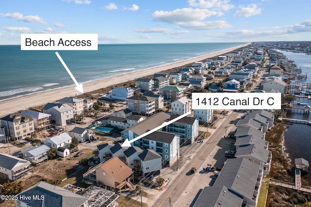 aerial view featuring a beach view and a water view