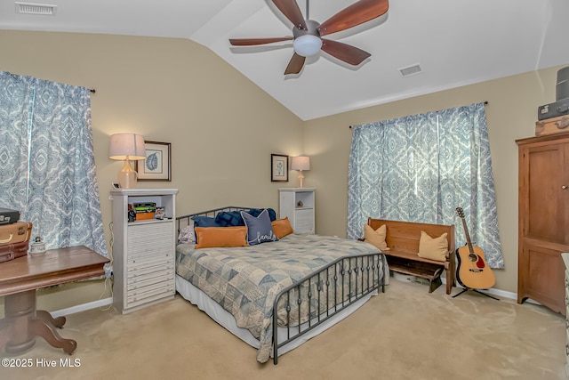 bedroom featuring light carpet, visible vents, a ceiling fan, and vaulted ceiling