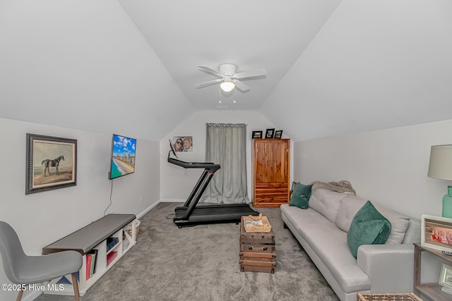 exercise area with lofted ceiling, carpet flooring, baseboards, and ceiling fan