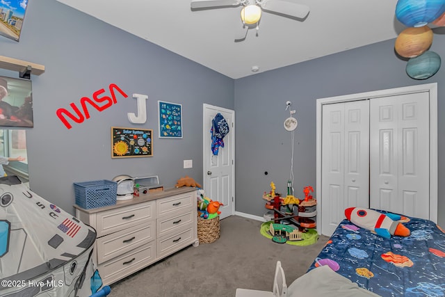 carpeted bedroom with a closet, baseboards, and a ceiling fan