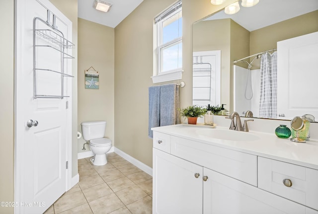 bathroom with tile patterned floors, visible vents, toilet, baseboards, and vanity