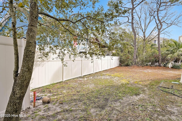 view of yard featuring fence