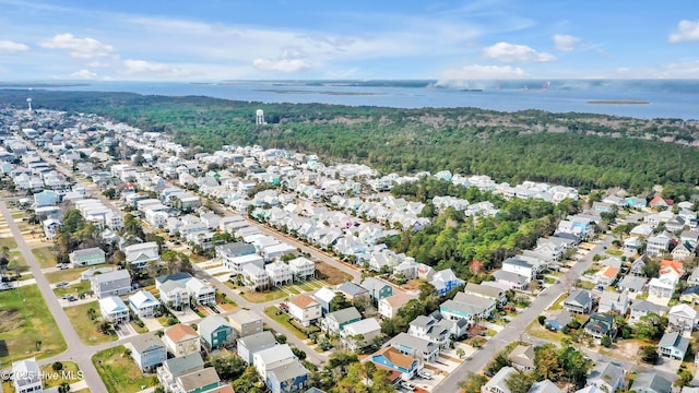 birds eye view of property with a residential view and a water view