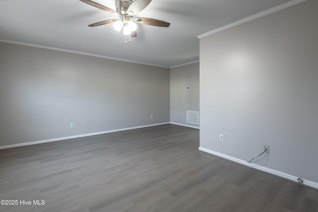 unfurnished room featuring a ceiling fan, wood finished floors, baseboards, visible vents, and crown molding