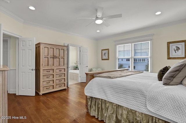 bedroom featuring crown molding, dark wood finished floors, recessed lighting, ensuite bath, and a ceiling fan