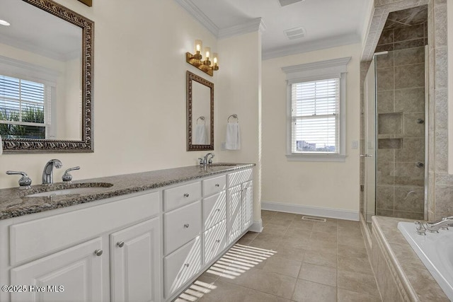 bathroom with visible vents, ornamental molding, baseboards, and a sink