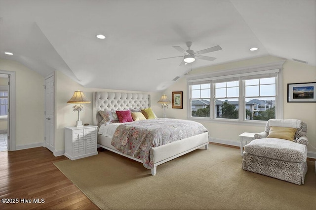 bedroom with a ceiling fan, wood finished floors, baseboards, lofted ceiling, and recessed lighting