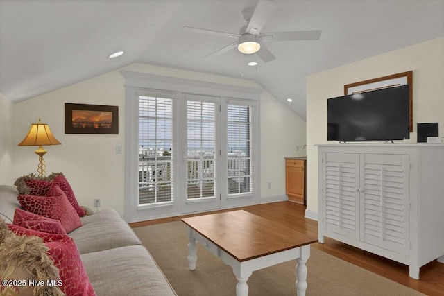 living room featuring vaulted ceiling, recessed lighting, wood finished floors, and ceiling fan