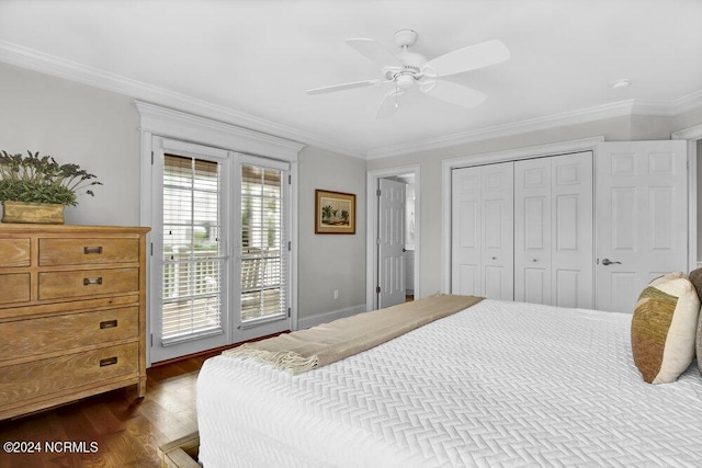 bedroom featuring access to outside, dark wood-style flooring, a closet, and ornamental molding