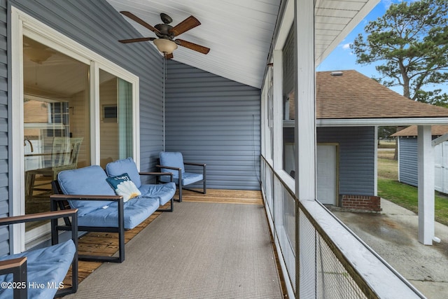 exterior space featuring ceiling fan