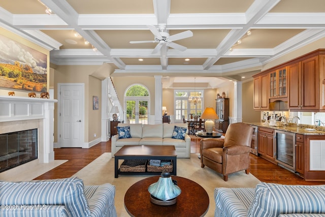 8904 Sound View Ct, Emerald Isle, NC 28594 - living area featuring ornamental molding, wood finished floors, beverage cooler, and coffered ceiling