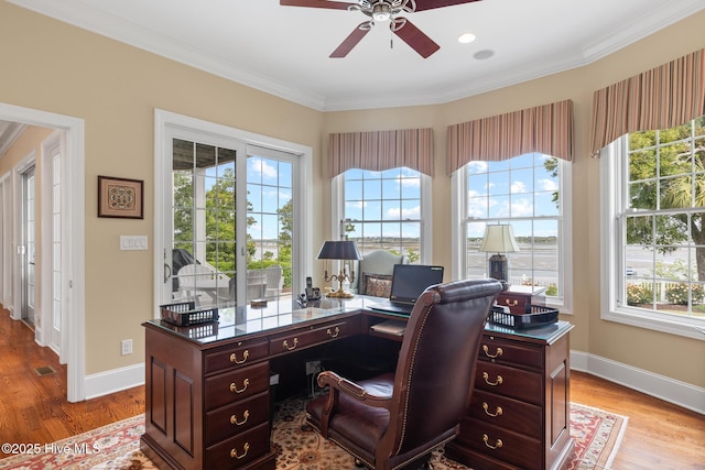 8904 Sound View Ct, Emerald Isle, NC 28594 - office area featuring ornamental molding, a ceiling fan, and plenty of natural light
